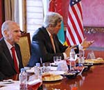 Kerry Aims to Ease Crisis over Unity Pact  